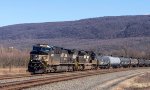 NS 4200 westbound on the point of a long manifest freight